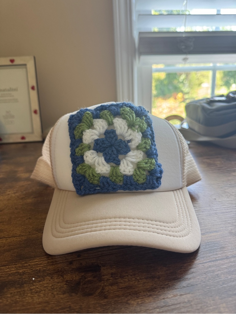 Beige Trucker Hat with Blue, Green & White Crochet Patch